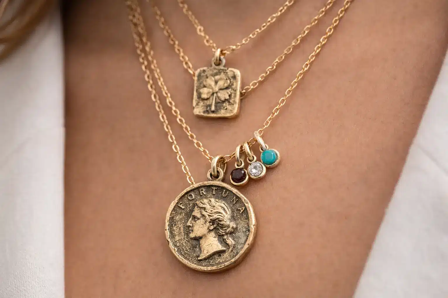 Layered vintage talisman and coin necklaces